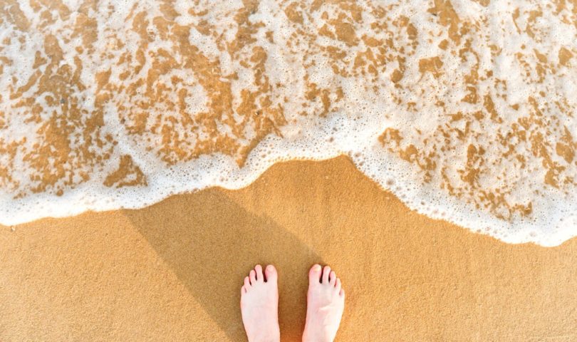 foot in beach